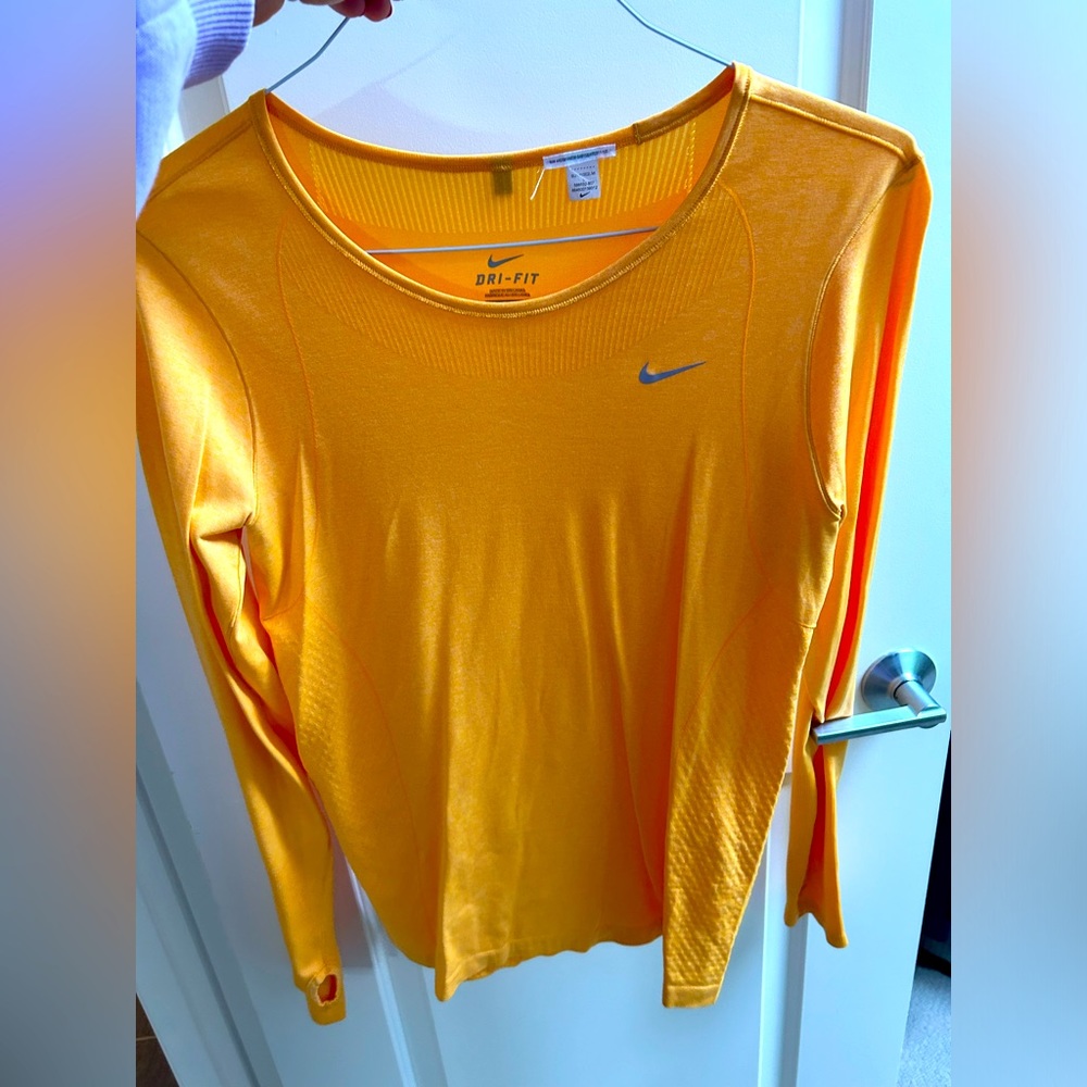 Mango colored Nike dri-fit long sleeve. Perfect for layering.